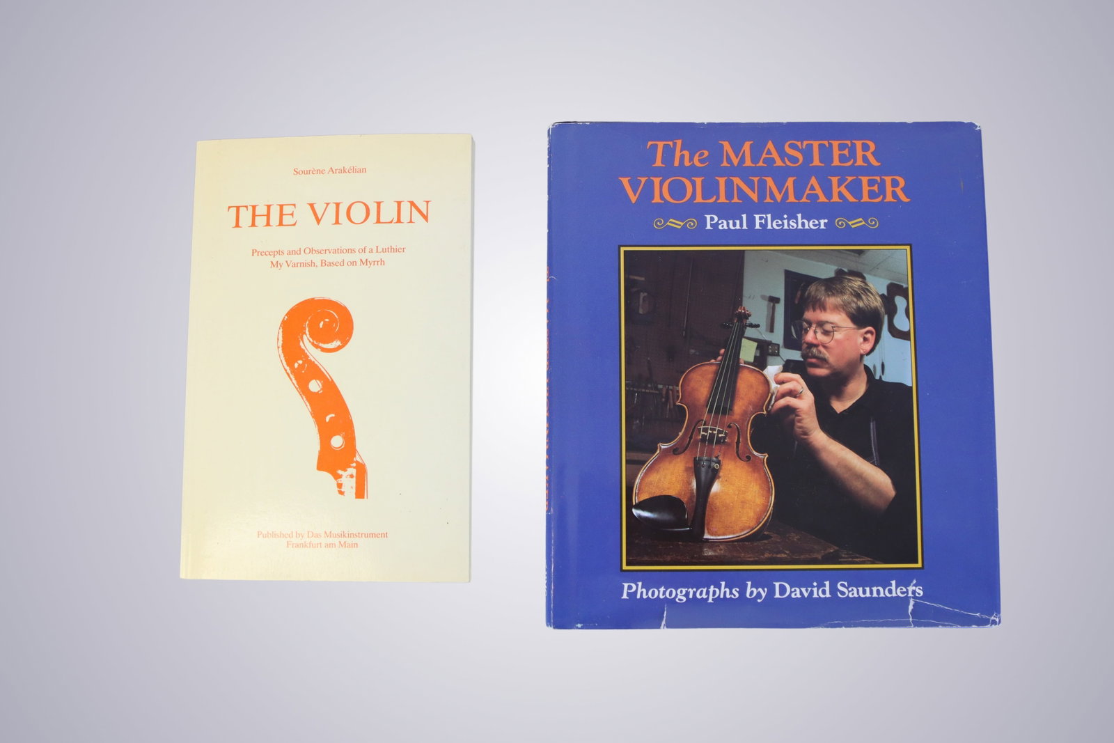 THE VIOLIN BY SOURENE ARAKELIAN AND THE MASTER VIOLINMAKER BY PAUL FLEISHER: THE VIOLIN BY SOURENE ARAKELIAN AND THE MASTER VIOLINMAKER BY PAUL FLEISHER Sourene Arakelian and Paul Fleisher. Group of two volumes relating to violin making and the craft of the luthier. Included