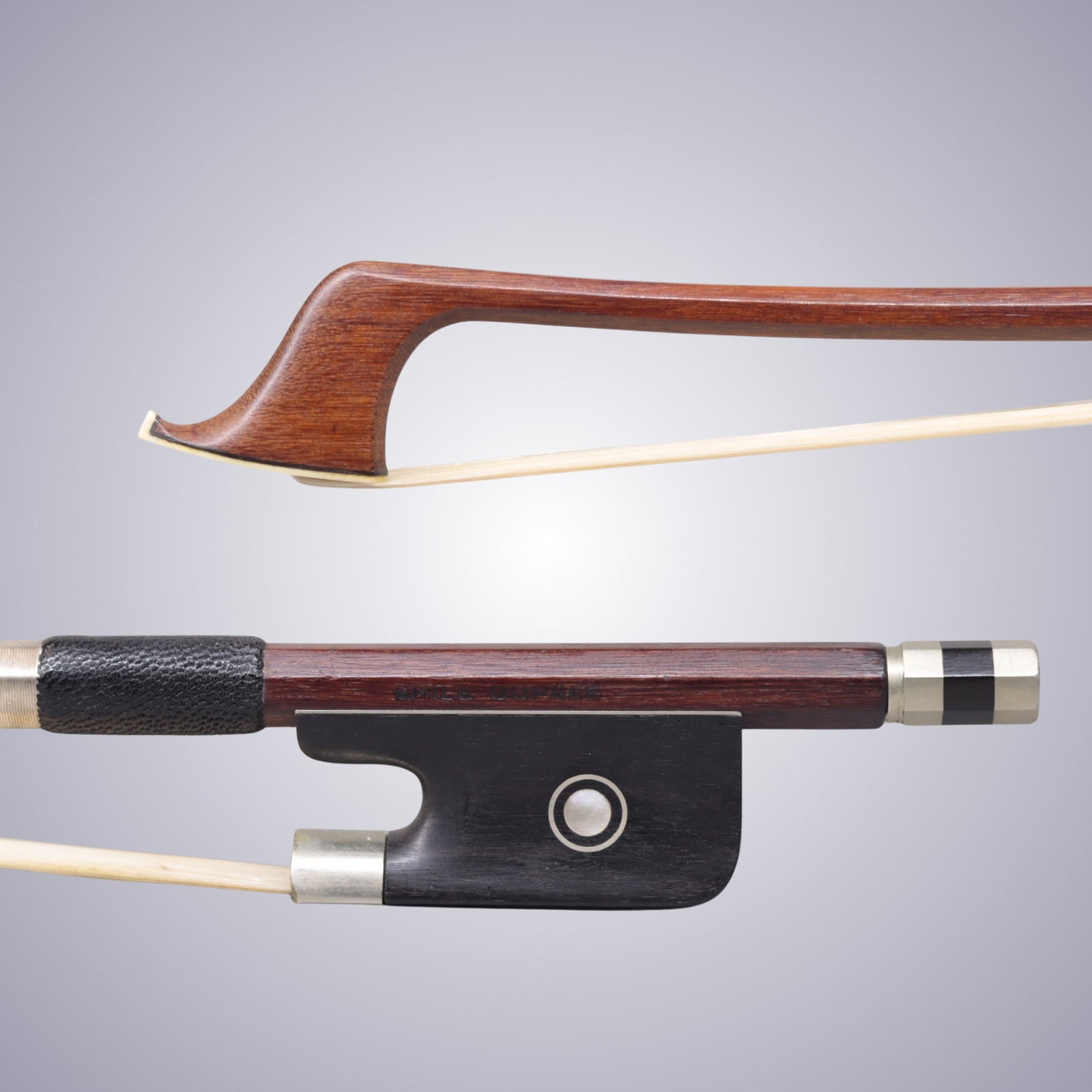 A CELLO BOW STAMPED EMILE DUPREE FRANCE: A CELLO BOW STAMPED EMILE DUPREE FRANCE Of Octagonal Pernambuco Stick, Ebony & Maillechort mounted. Stamped on stick above frog: EMILE DUPREE Stamped on understick: FRANCE Approximate Dimensions: 72