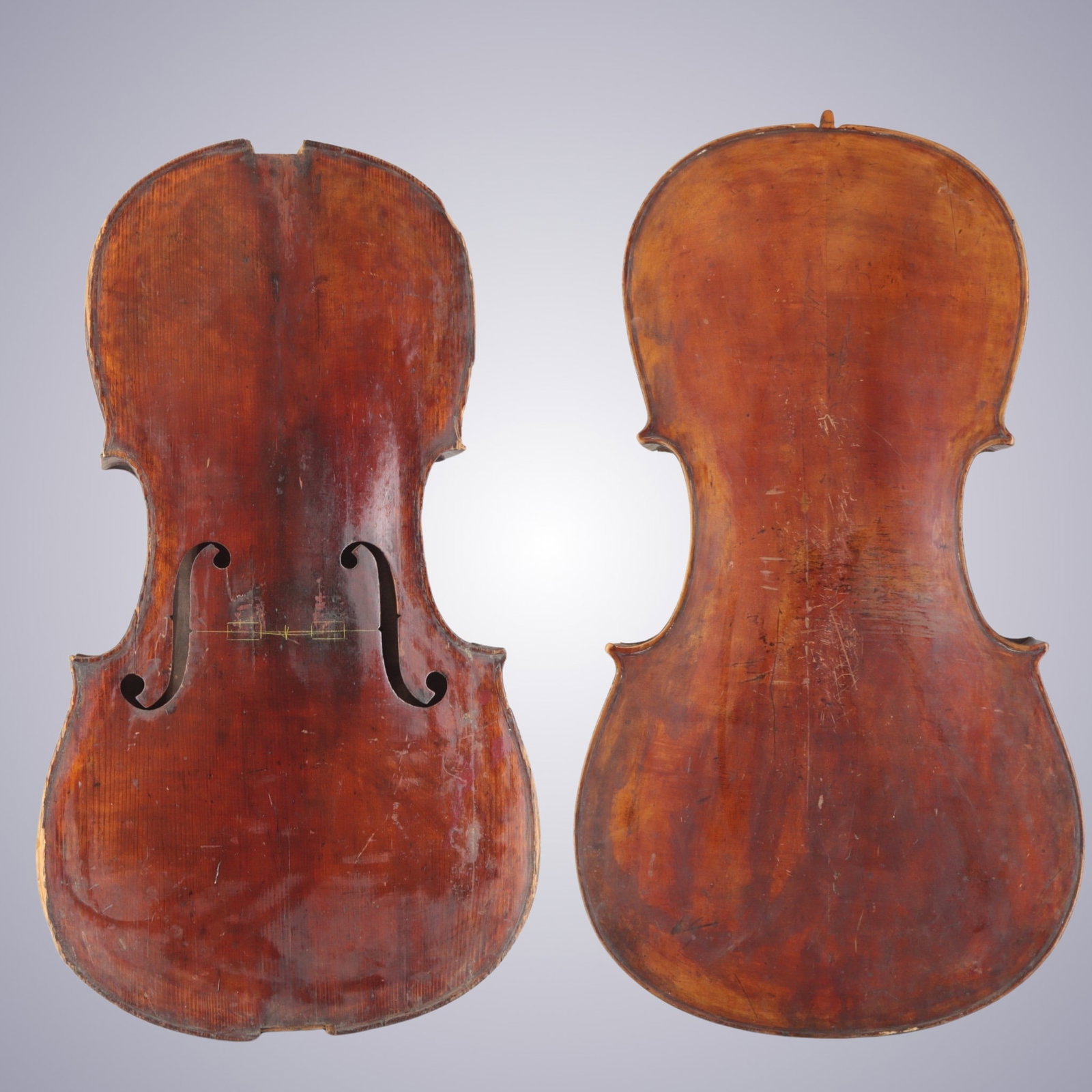A CELLO FOR RESTORATION & REPAIR: A CELLO The back is of One-piece, quarter-cut Poplar. The ribs and scroll are of similar wood. The top is of two-piece spruce quarter-cut, joined at the center with narrow grain widening from center.