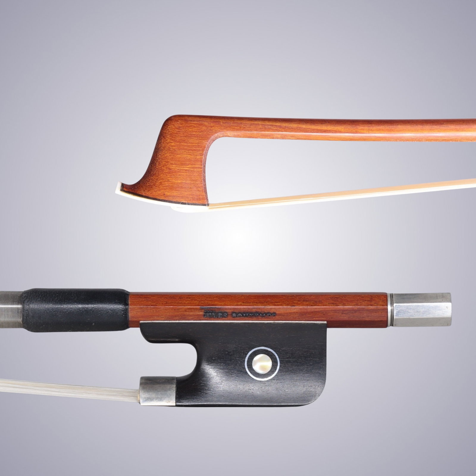 A SILVER MOUNTED VIOLA BOW BY JULES BONTEMP: A SILVER MOUNTED VIOLA BOW BY JULES BONTEMP Of Round Pernambuco Stick, Ebony & Silver mounted. Stamped on stick above frog: JULES BONTEMPS Approximate Dimensions: 75 cm (Total Length - Head to