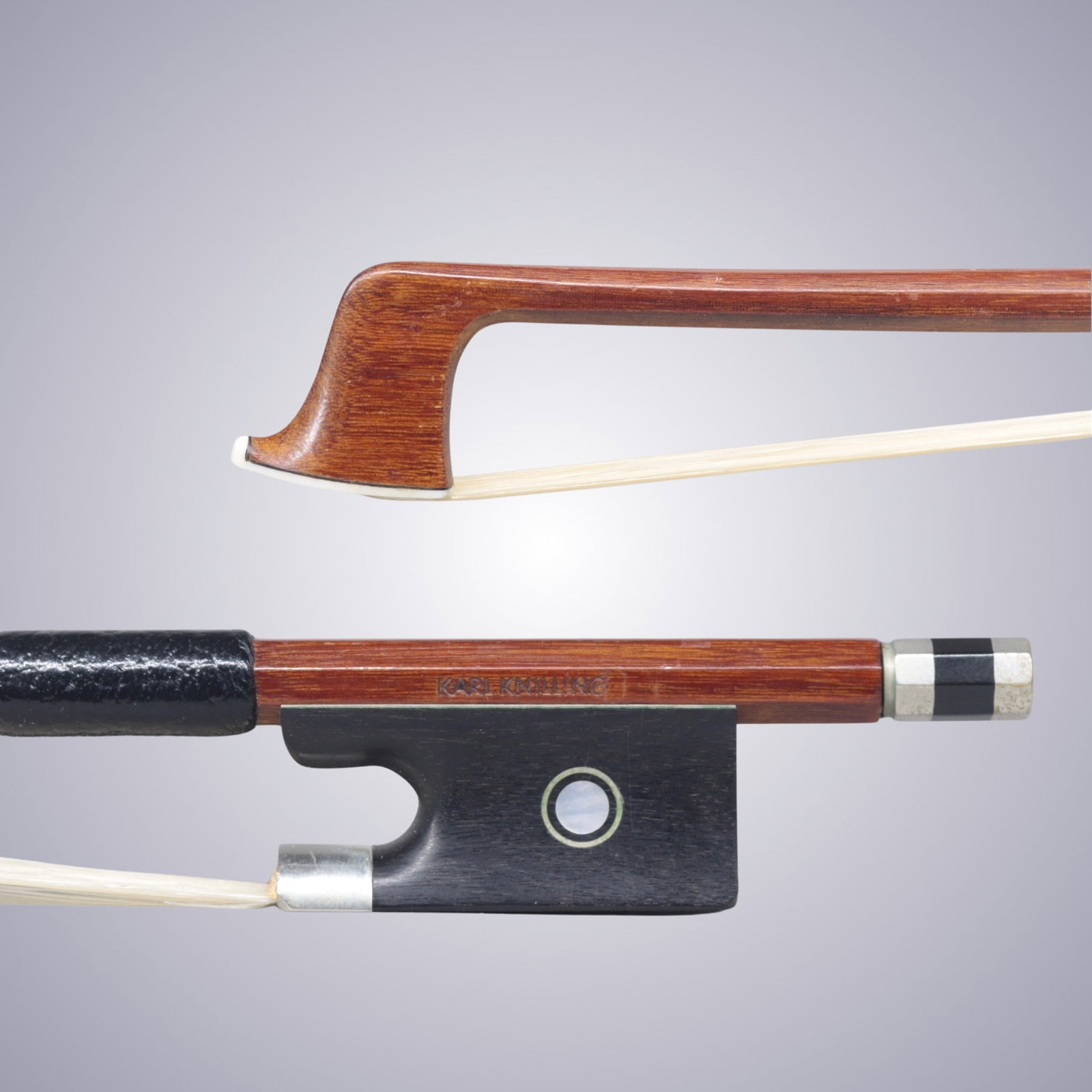 A VIOLIN BOW STAMPED KURT KNILLING: A VIOLIN BOW STAMPED KURT KNILLING Of Octagonal Stick, Ebony & Nickel mounted. Stamped on stick above frog: KURT KNILLING Approximate Dimensions: 74.2 cm (Total Length - Head to Adjustor) 62.9 grams