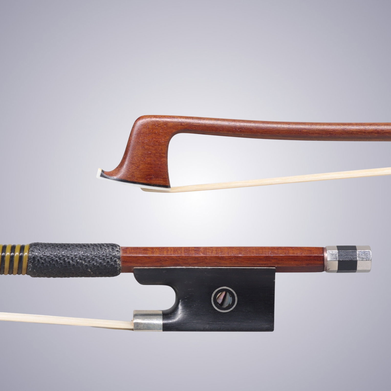 A VIOLIN BOW UNSTAMPED: A VIOLIN BOW UNSTAMPED Of Round Pernambuco Stick, Ebony & Nickel mounted. Unstamped. Approximate Dimensions: 74.5 cm (Total Length - Head to Adjustor) 63.5 grams in weight
