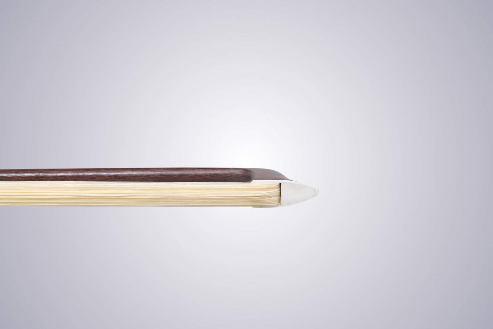 A VIOLIN BOW STAMPED P.C. - 8