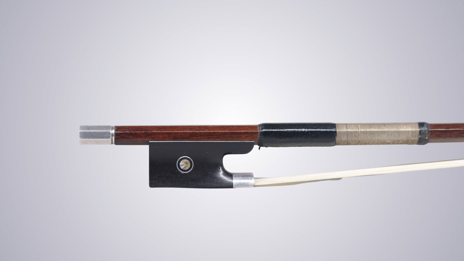 A SILVER MOUNTED VIOLIN BOW STAMPED E. WERNER - 8