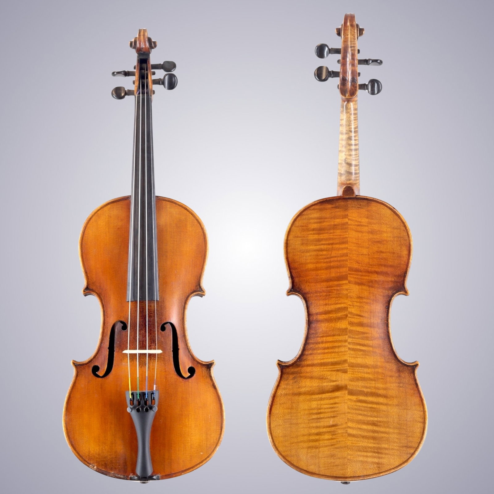 A VIOLIN LABELED ANTONIUS STRADIVARIUS 1721: A VIOLIN LABELED ANTONIUS STRADIVARIUS 1721 The back is of two-piece maple, quarter-cut joined at the center and with narrow and medium width flames descending slightly from center. The ribs and