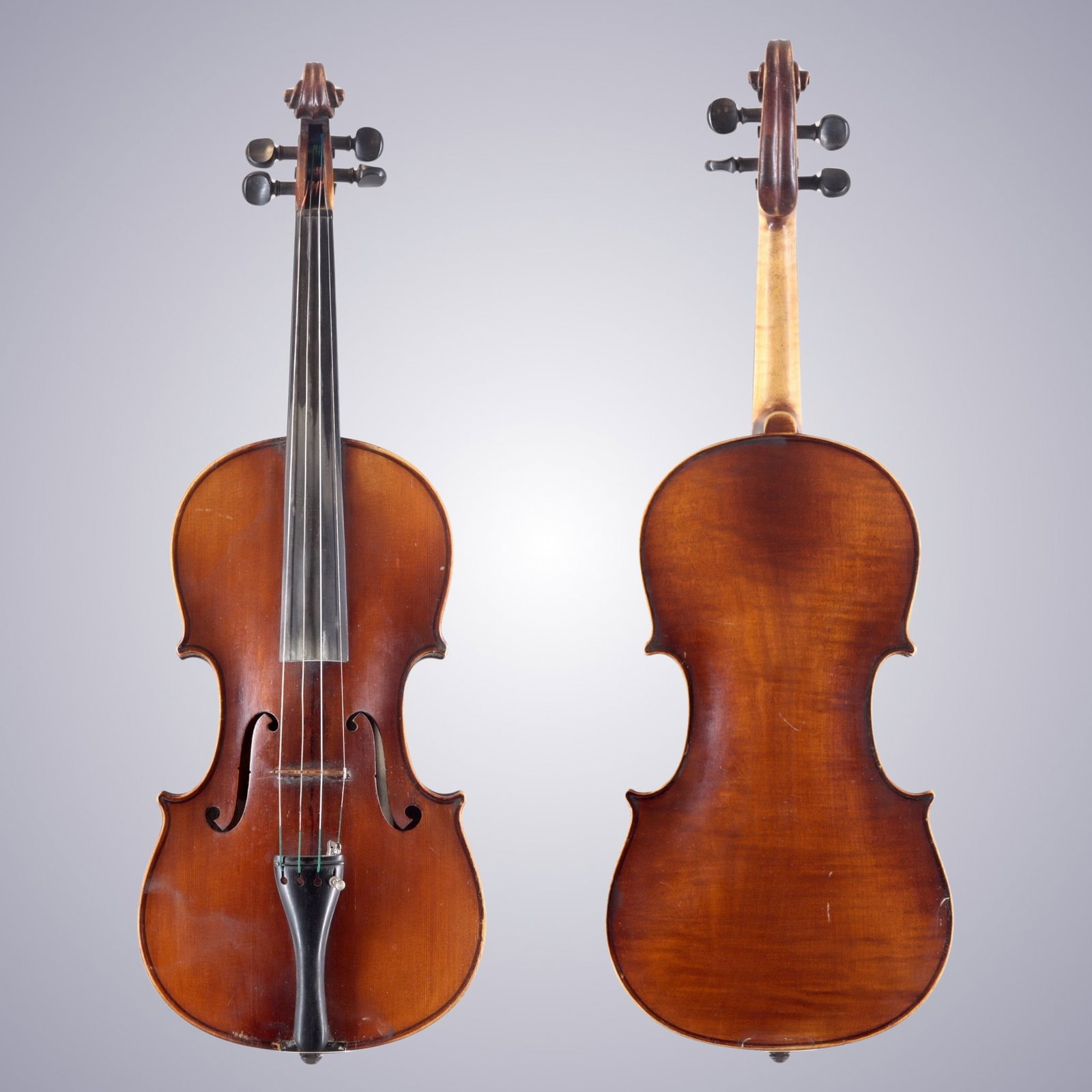 A ONE-PIECE BACK VIOLIN LABELED NICOLAS AMATUS REPAIRED 1918: A ONE-PIECE BACK VIOLIN LABELED NICOLAS AMATUS REPAIRED 1918 The back is of one-piece maple, quarter-cut with flames. The ribs and scroll are of similar wood. The top is of two-piece spruce quarter-cu