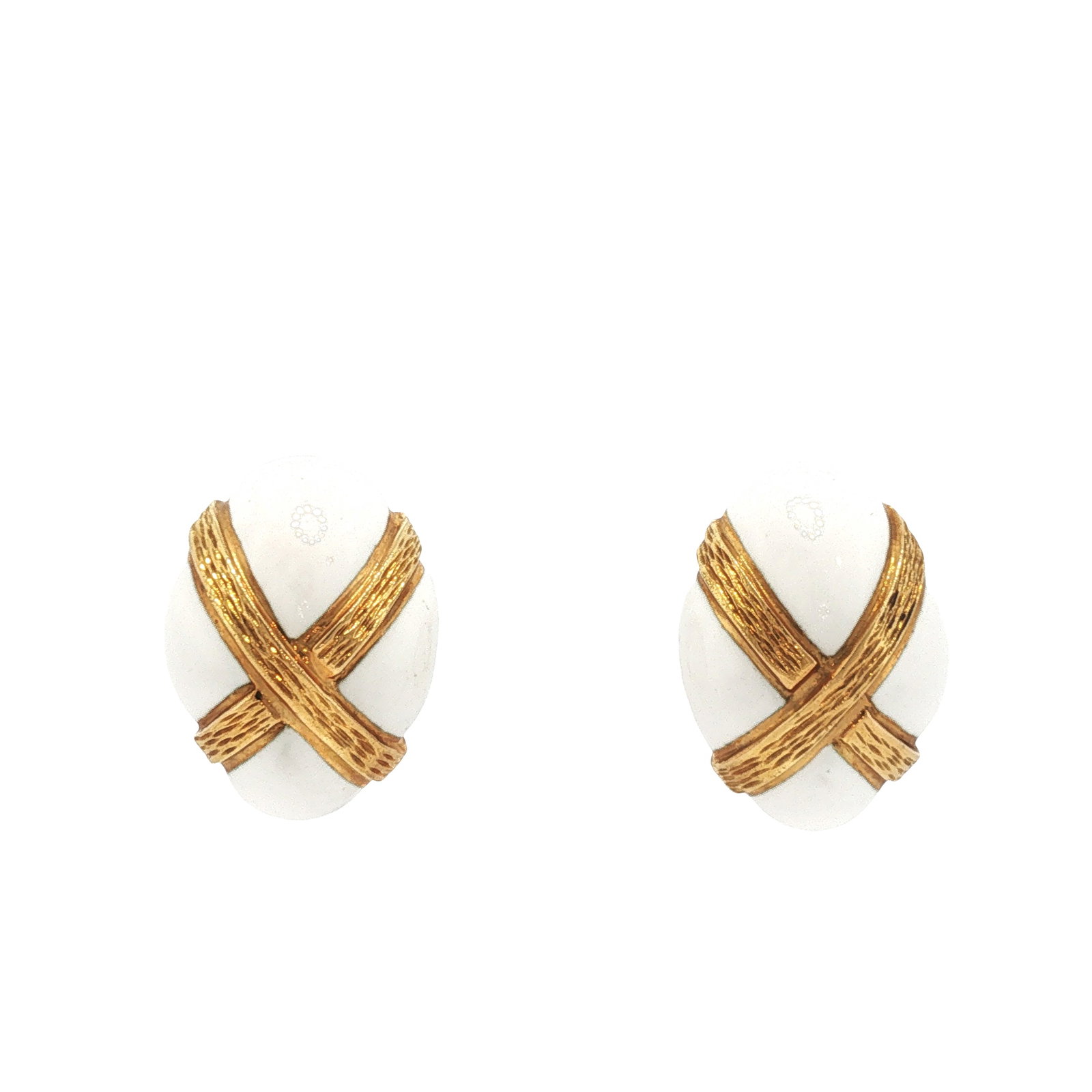 DAVID WEBB 18K GOLD ENAMEL EARRINGS: DAVID WEBB 18K GOLD ENAMEL EARRINGS Designed as a pair of oval white enamel earrings, each decorated with textured 18K yellow gold crossed ribbon motifs, completed with clip backs. Approximate Dimensi