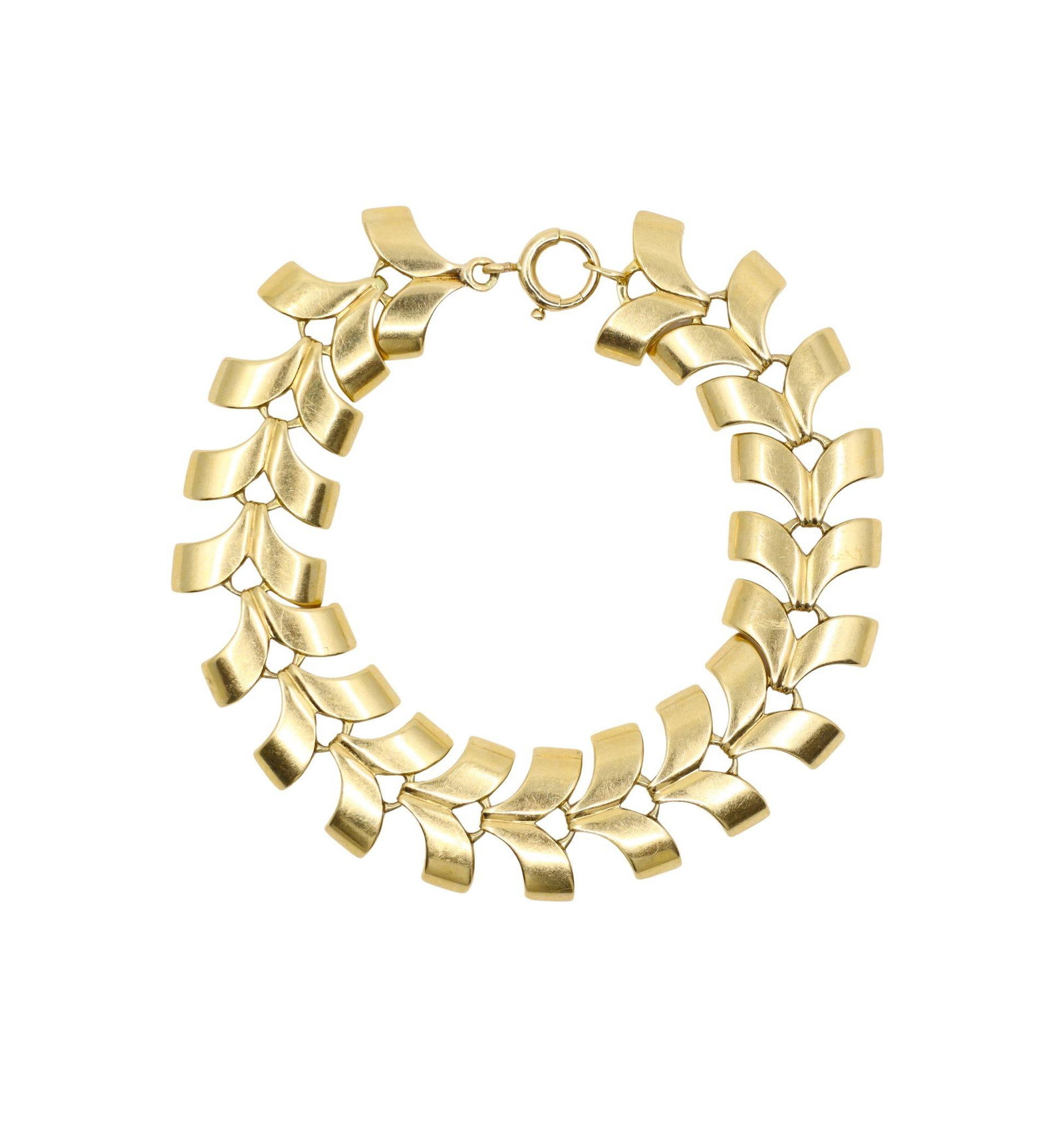 A RETRO TIFFANY & CO. 14K GOLD BRACELET: A RETRO TIFFANY & CO. 14K GOLD BRACELET A Retro Tiffany & Co. bracelet crafted in 14 karat yellow gold, composed of articulated stylized ribbon-form links with a softly satin-finished surface. The scu