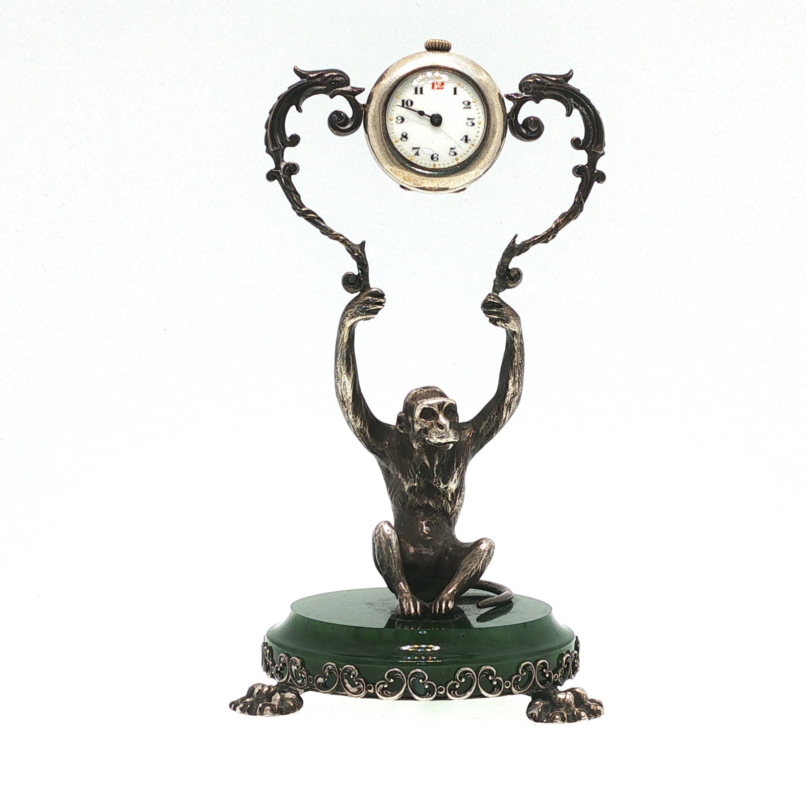 A CARTIER SILVER MONKEY-FORM TABLE STAND WITH POCKET WATCH (1 of 12)