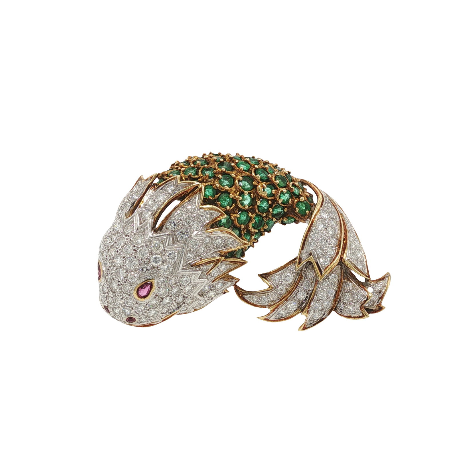 LA TRIOMPHE FISH BROOCH: LA TRIOMPHE FISH BROOCH A signed La Triomphe eighteen karat gold fish brooch pave-set with approximately 6.0 carats of diamonds, the articulated body accented by approximately 6.3 carats of emeralds i