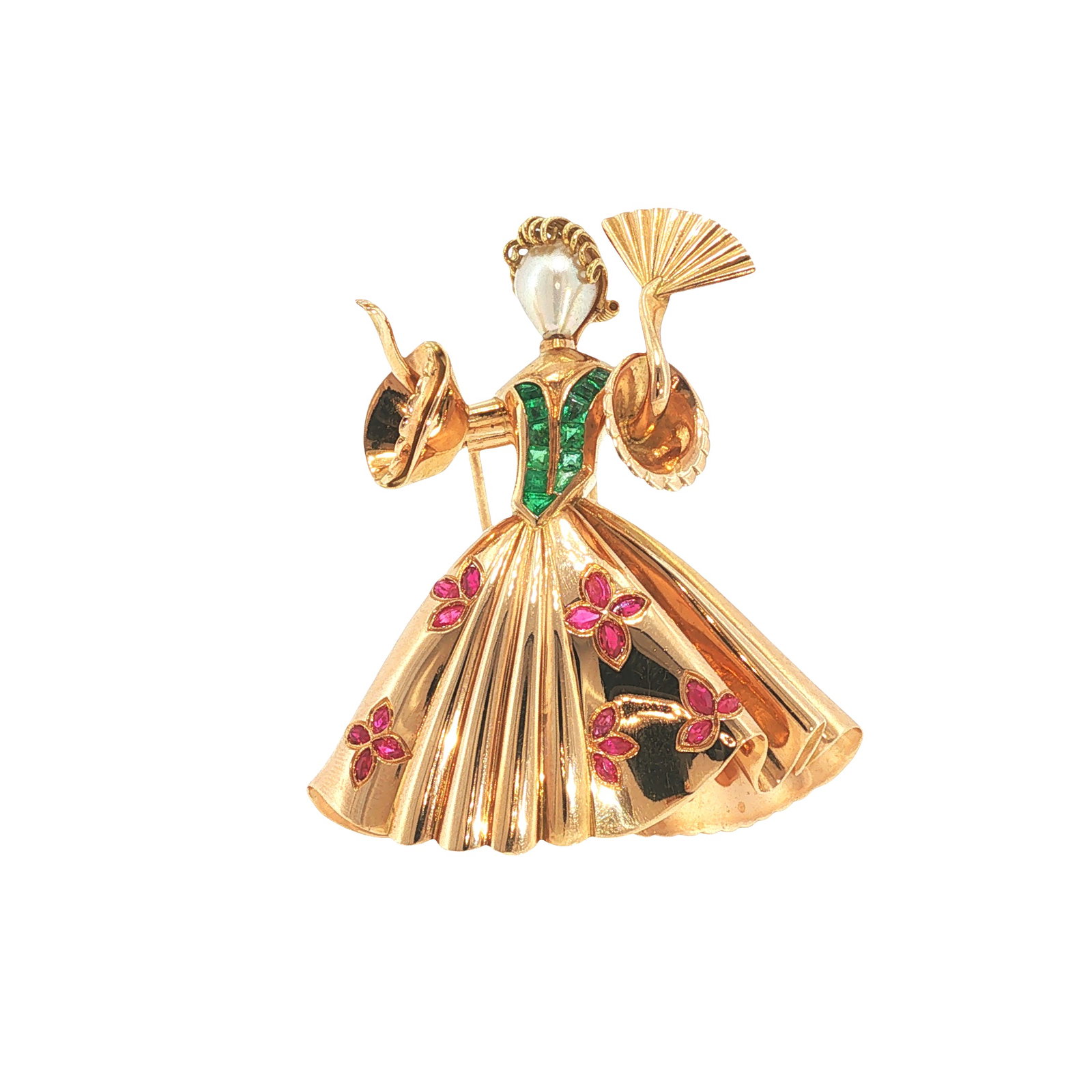 AN 18K GOLD, RUBY, EMERALD AND PEARL BALLERINA BROOCH: AN 18K GOLD, RUBY, EMERALD AND PEARL BALLERINA BROOCH An 18 karat gold ballerina brooch modeled as a dancer in a flared skirt, the bodice set with emeralds and the skirt accented with ruby-set floral 