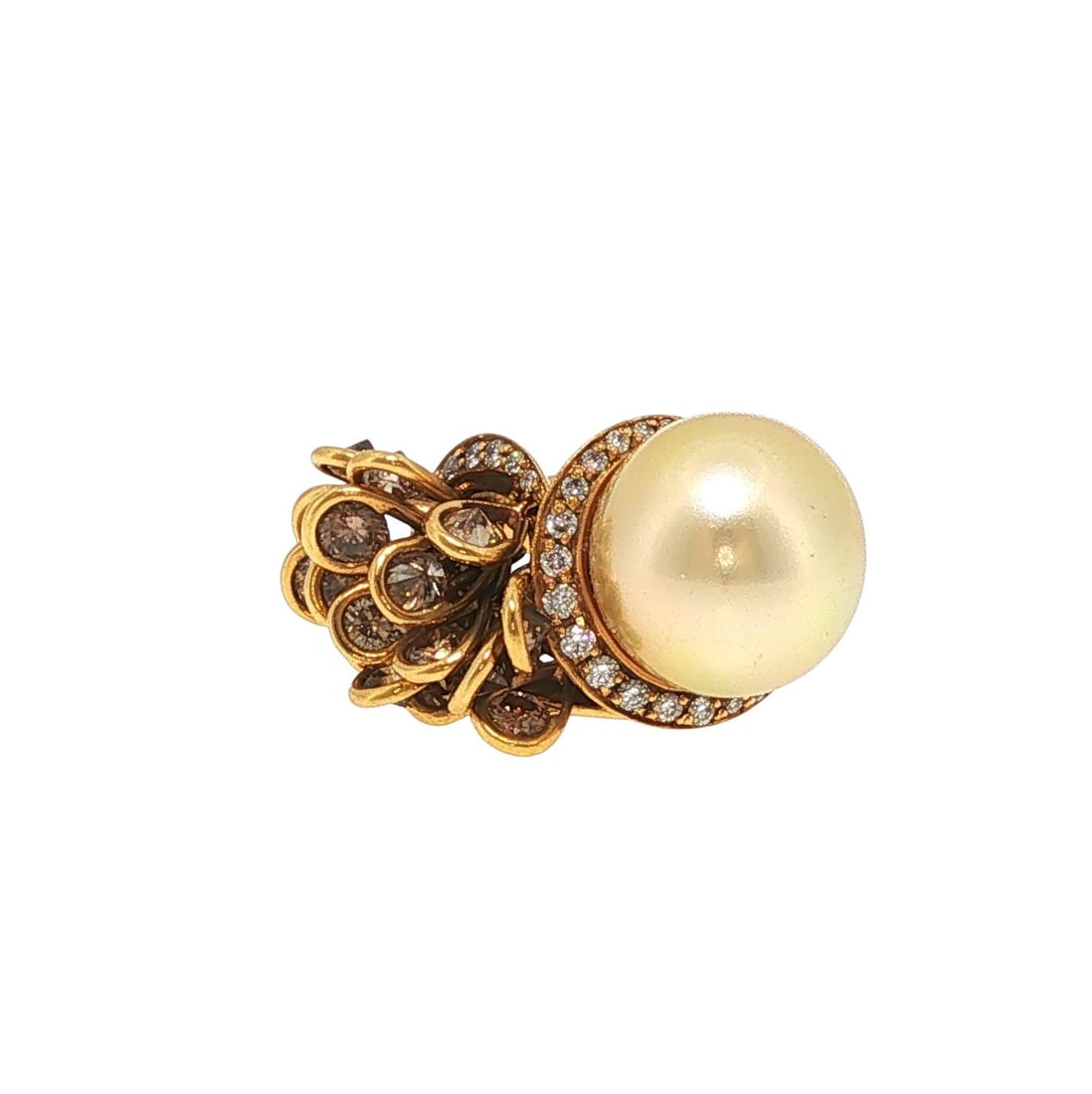 UTOPIA 18K GOLD GOLD SOUTH SEA PEARL AND DIAMOND RING: UTOPIA 18K GOLD SOUTH SEA PEARL AND DIAMOND RING An 18K gold ring by Utopia centered by a gold South Sea pearl, accented by a crescent of round brilliant-cut diamonds. The asymmetrical design is