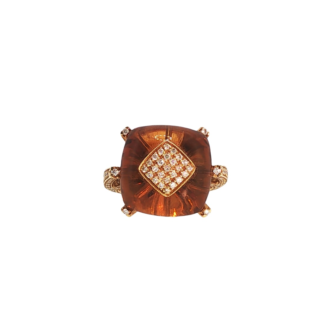 IO SI 18K GOLD DIAMOND AND CITRINE RING: IO SI 18K GOLD DIAMOND AND CITRINE RING An 18K gold ring by IO SI centered by a cushion-cut citrine, overlaid with a diamond-set square motif. The pierced shoulders are further accented with round