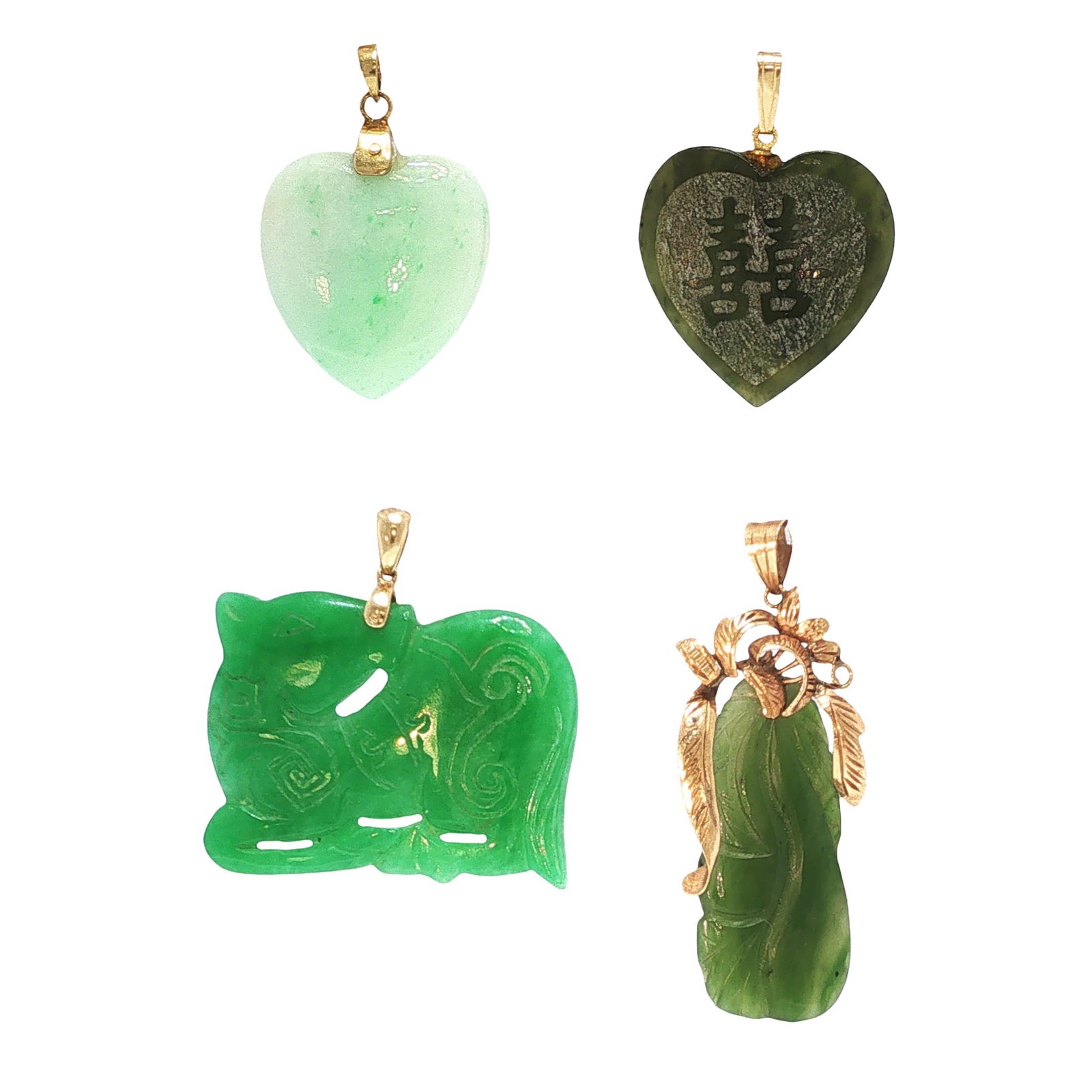 A GROUP OF FOUR 14K GOLD JADE PENDANTS: GROUP OF FOUR 14K GOLD JADE PENDANTS A group of four jade pendants, each mounted with a 14K gold bail. The group includes two heart-form pendants, one carved elephant pendant, and one carved figural p