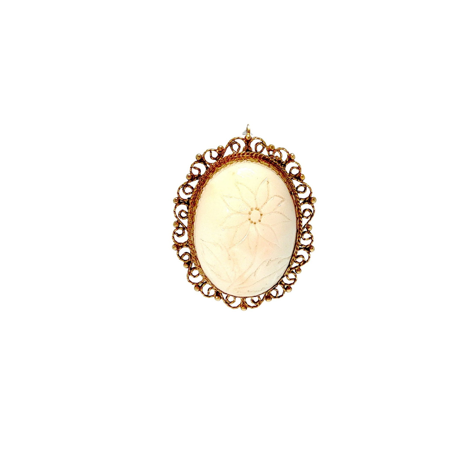 14K CORAL PENDANT: 14K GOLD CARVED CORAL PENDANT A 14K gold pendant centered by an oval carved coral plaque depicting a floral motif, enclosed within an openwork filigree-style gold surround with rope-twist detailing. T