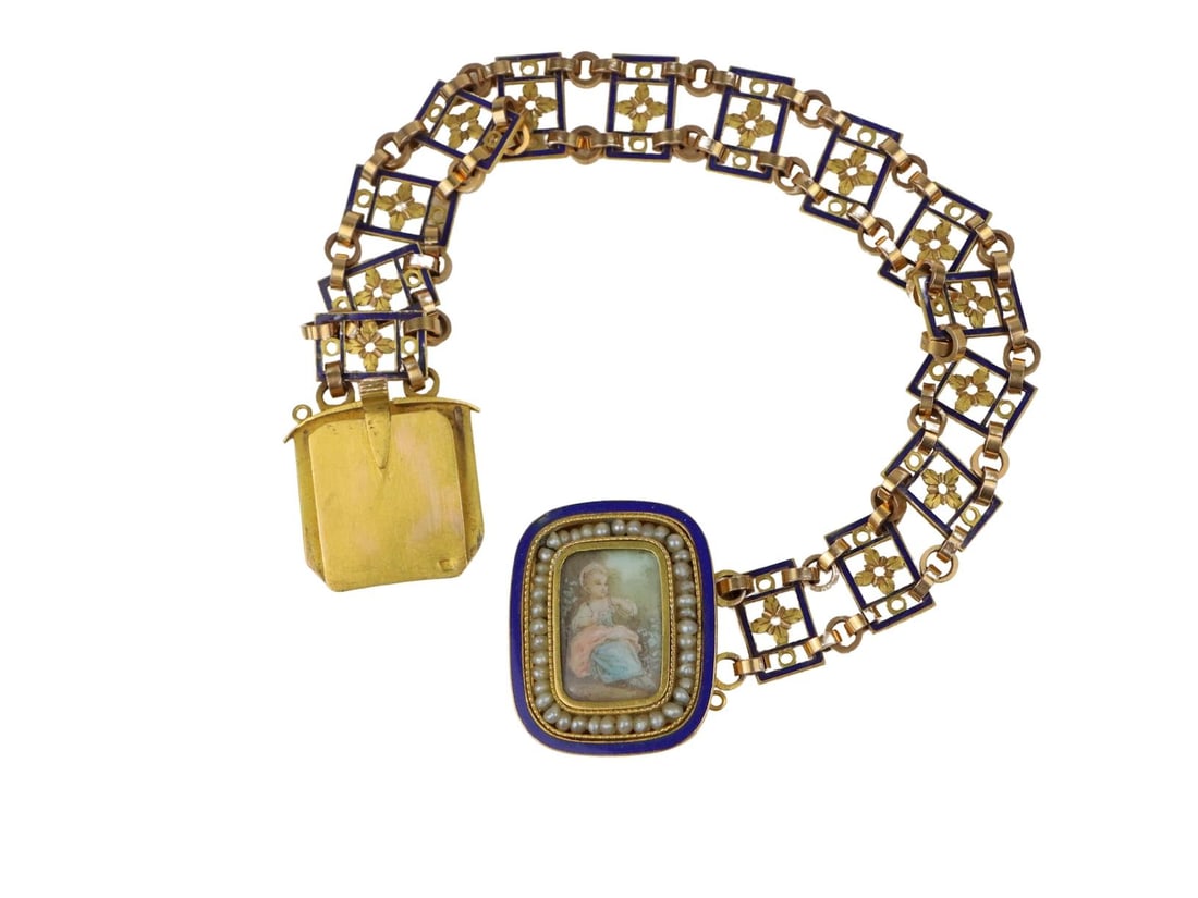 ANTIQUE 18K GOLD ENAMEL AND PEARL BRACELET: AN ANTIQUE 18K GOLD, ENAMEL, PEARL, AND MINIATURE PORTRAIT BRACELET An antique 18K gold bracelet composed of openwork rectangular links decorated with blue enamel and floral motifs, centering a rectan