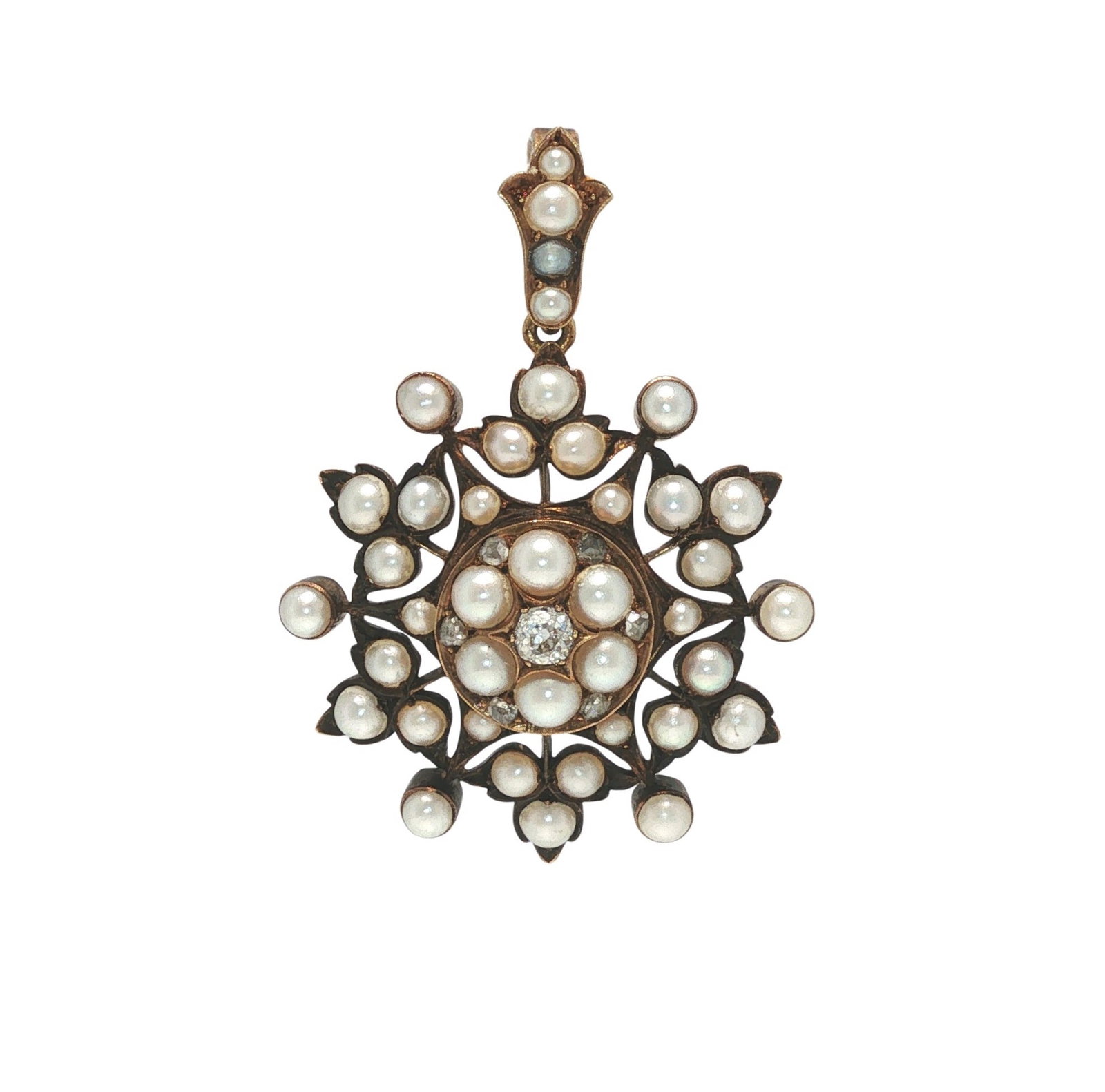 VICTORIAN 14K GOLD PEARL AND DIAMOND STARBURST PENDANT: VICTORIAN 14K GOLD PEARL AND DIAMOND STARBURST PENDANT A Victorian 14K gold pendant designed in a starburst motif, centered by an old-cut diamond and surrounded by natural seed pearls with additional 