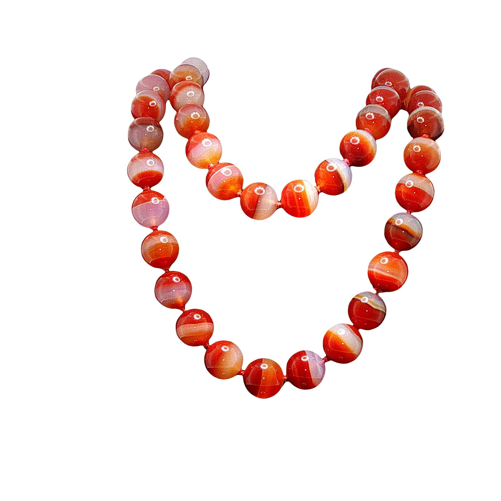 LARGE BANDED AGATE BEAD NECKLACE: LARGE BANDED AGATE BEAD NECKLACE Composed of graduated polished banded agate beads displaying attractive natural bands in shades of red, orange, cream, and gray. The necklace is strung as a single str