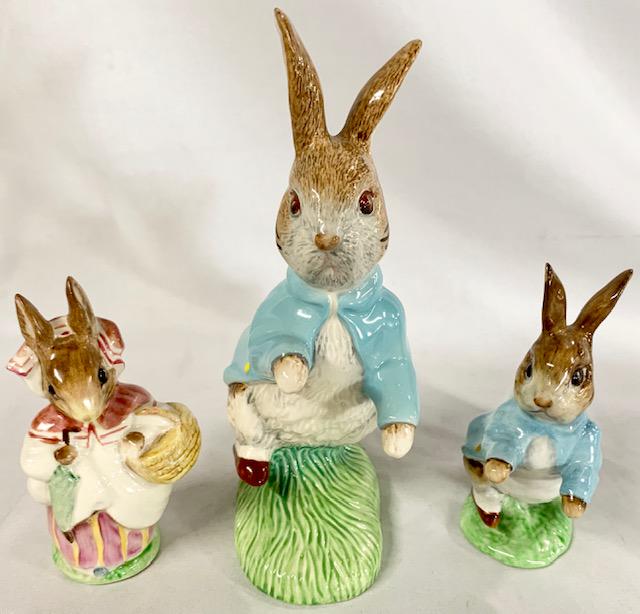 3 Pcs Beswick Beatrix Potter Figurines: 3 Pcs Beswick Beatrix Potter Figurines Peter Rabbit Royal Doulton 1992 - 7" Peter Rabbit 1948 - 4" Mrs. Rabbit 1951 - 4" See Photo's For A Better Idea Of Description And Condition