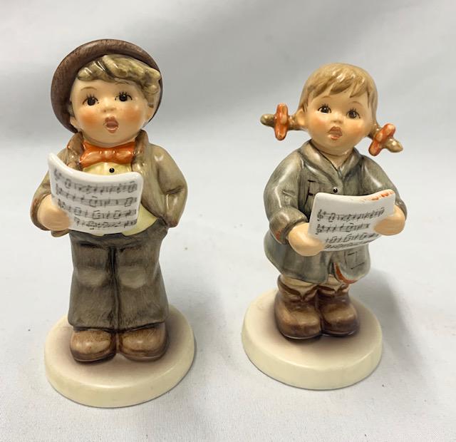 Pair of Goebel Carrolers Pair Of Goebel Carrolers Boy: Pair Of Goebel Carrolers Boy 2002- #846 2004-2005 Exclusive Edition Of M. I. Hummel Club 4" Girl 2002 - #2182 2003-2004 Exclusive Edition Of M. I Hummel Club 3 3/4"