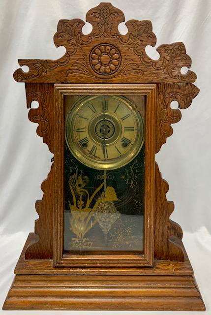Gingerbread Welch Clock: Gingerbread Welch Clock Shelf/ Wall Apx. 22 1/2" T x 15" W Photo's are considered part of the description and condition.