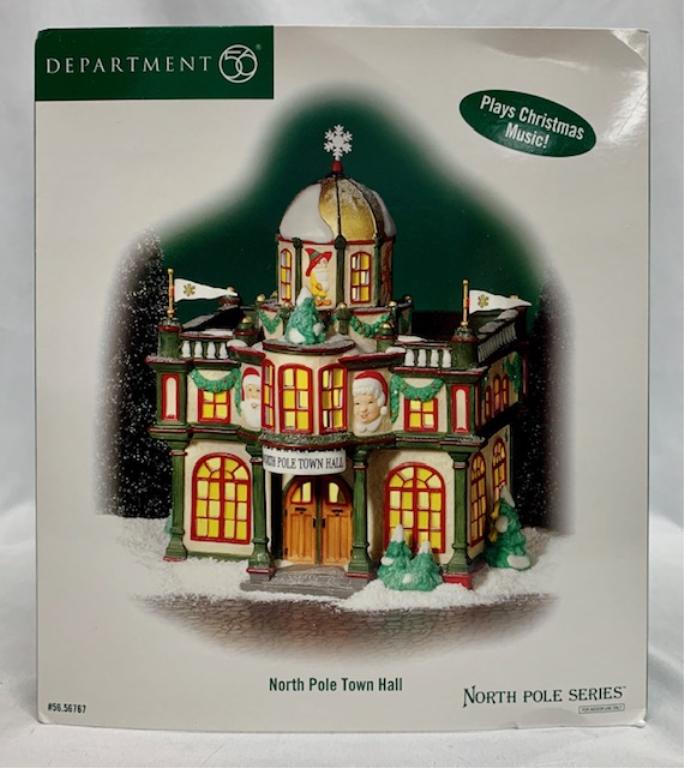 Dept 56 "North Pole Town Hall": Dept 56 north pole series "North Ple Town Hall". Plays Christmas music. In box. Photos are considered part of the description and condition.