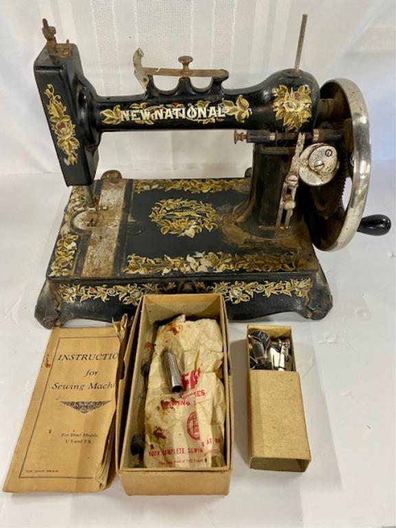 Antique New National Sewing Machine: Antique New National Sewing Machine. "Light Running"- New Home. Stenciled - Some paint/stencil damage. Hand Crank. HEAVY!