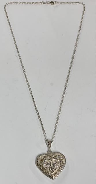 Sterling Heart Necklace w/ Love Birds: Sterling Heart Necklace with Love Birds. 17". Photo's are considered part of the description and condition.