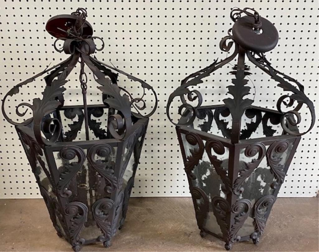Pair of Large Ornate Metal Hanging Lights: Pair of Large Ornate Metal Hanging Lights. Each takes 6 Candle Type Light Bulbs. Apx. 28 1/2" H x 18" W. Photo's are considered part of the description and condition.