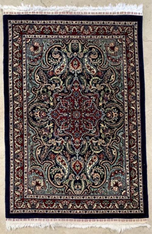 Small Throw Wool Oriental Rug: Small Throw Wool Oriental Style Rug. Burgandy, Blues and Beiges. Apx. 46" x 30" Very Nice Condition. Photo's are considered part of the