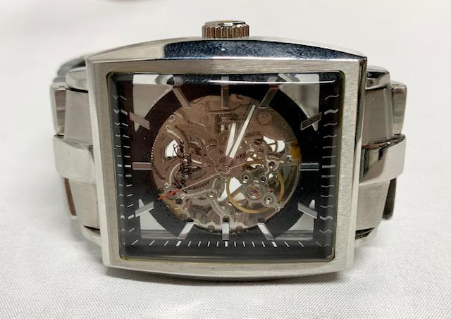 Kenneth Cole Watch: Men's Kenneth Cole Watch. Skeleton Watch. New York. Photo's are considered part of the description and condition.
