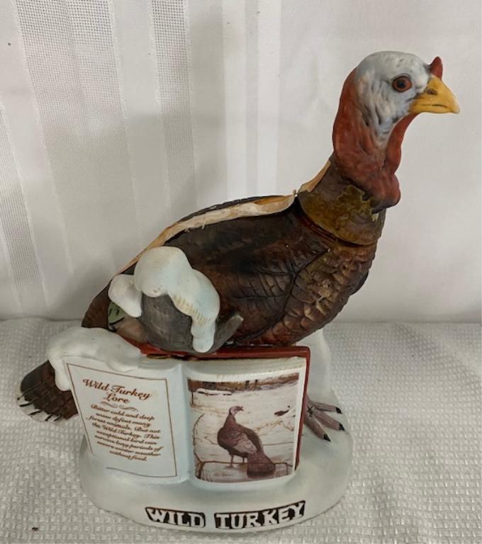 Wild Turkey Liquor Decanter: Wild Turkey Liquor Decanter. Austin Nichols & Co. Wild Turkey 101 Proof 1980 "The Wild Turkey of the Winter Forrest" Limited Edition Series II No. 2. The Head is a bit loose when on. Photos are consid