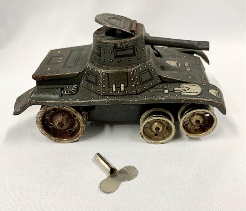 Wind Up Toy Tank Marked Gama Tank No70: Wind Up Toy Tank Marked Gama Tank. No. 70. with Key - Works. Missing Tread Apx. 5 1/2" x 3 1/4" W x 3" H. Photo's are considered part of the description and condition.