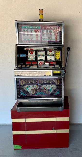 Double Diamond One Arm Bandit: Double Diamond One Arm Bandit. Slot Machine. (Typical of Slot Machines in Casinos) Model Number: B5029CIW Dated 12/93 IGT (International Game Technology). Takes US Currency - Accepts 1's, 5's, 10's, 2
