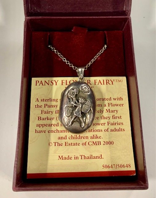 Sterling Pansy Flower Fairy Locket on Chain: Pansy Flower Fairy Sterling Locket Past Times. Apx. 15" Chain. In the Original Box, Photos are considered part of the description and condition.