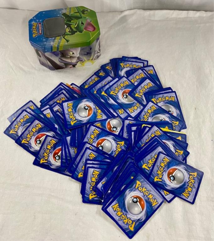 Assorted Pokémon Cards In Tin