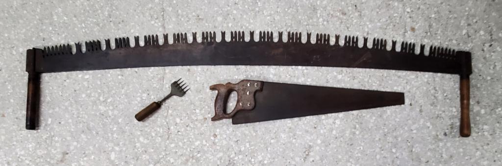 Vintage Crosscut Saw/Hand Saw/Ice Pick: Vintage Crosscut Saw/Hand Saw/ and Ice Pick. *Vintage 2 Man 2 Handle Cross Cut Saw - Apx. 66" L x 12" W. *Vintage Hand Saw - Apx. 29" L x 7" H. *Vintage 5 Prong Wood Handle Ice Chipper - Apx. 9" L. Ph