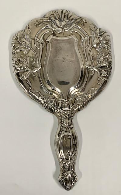Beautiful Vintage Sterling Engraved Hand Mirror: Beautiful Vintage Sterling Engraved Hand Mirror. Beveled Mirror. Mirror has aging. Some dents. Apx 9 1/2". Photos are considered part of the description and condition.