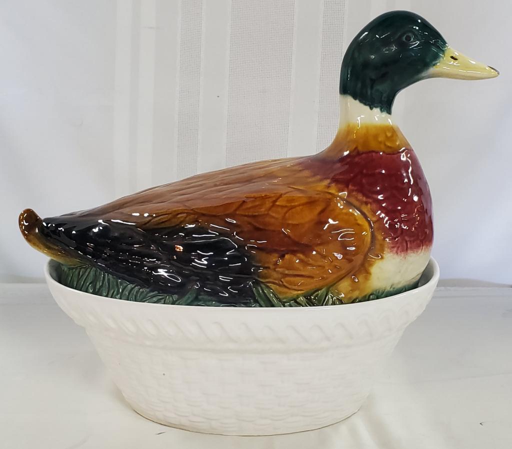Olfaire Mallard Duck Porcelain Centerpiece: Olfaire Mallard Duck on Basket Tureen/Covered Casserole Centerpiece. #720-AC. Made in Portugal. Apx. 12" H x 15" L. Photo's are considered part of the description and condition. 502-15