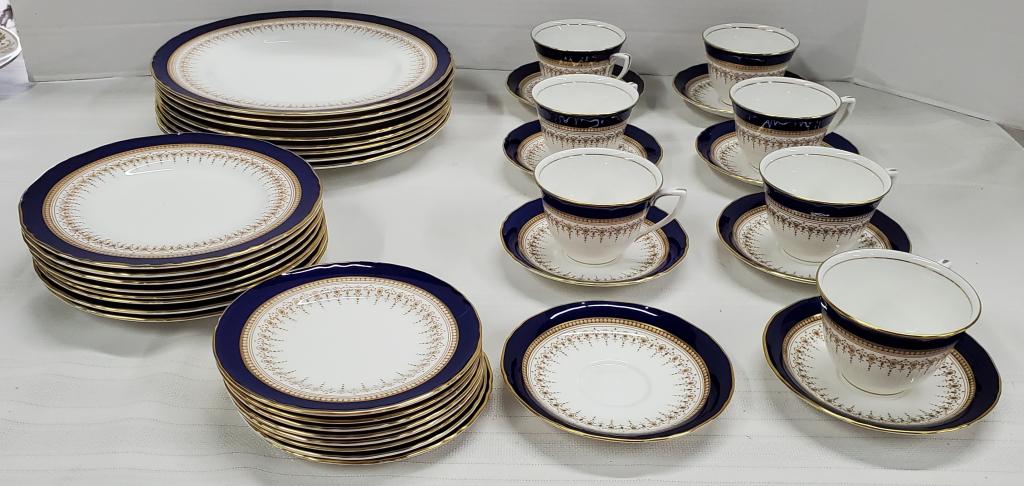 39 Pcs. Royal Worcester Regency China Set: 39 Pcs. Royal Worcester Regency Royal Blue Fine China Set. Bone China. 8 - Dinner Plates 11". 8 - Salad Plates 8". 8 - Bread Plates 6". 7 - Cups. 8 - Saucers. Photo's are considered part of the descri