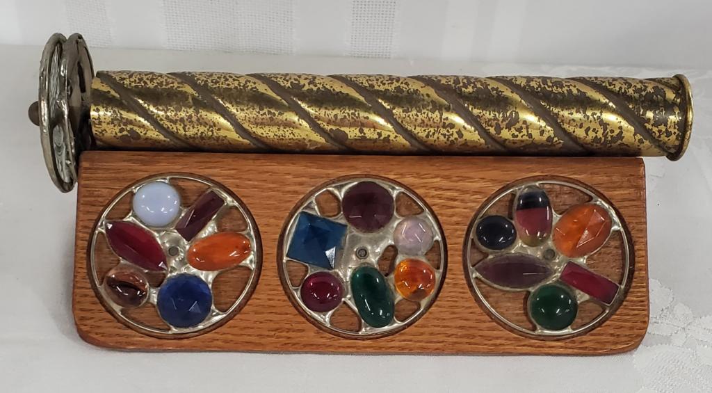 Brass Vintage Kaleidoscope Duel Wheel w/Stand: Brass Vintage Kaleidoscope - Duel Wheel 5 Stained Glass Gemstone Wheels - Wood Stand. Brass shows some discoloration Wheel are in good condition - No cracked or missing stones. Photos are considered p