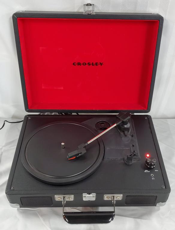 Crosley Portable Turntable Record Player: Crosley Portable Turntable Record Player. 3 Speed with Power Cord. Works. Manufactured August 2013. Apx. 14" x 10" x 4 1/2". Photos are considered part of the description and condition.