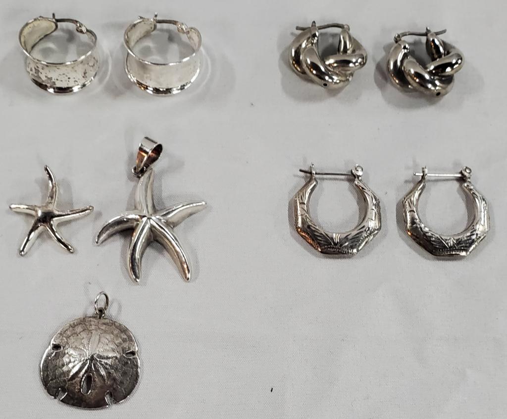 3 Sterling Pendants & 3 Sets of Sterling Earrings: 3 Sterling Pendants and 3 Sets of Sterling Earrings. *2 Sterling Starfish Pendants. *1 Sterling Sand Dollar Pendant. *3 Pair of Hoop Post Pierced Earrings. Photos are considered part of the descriptio