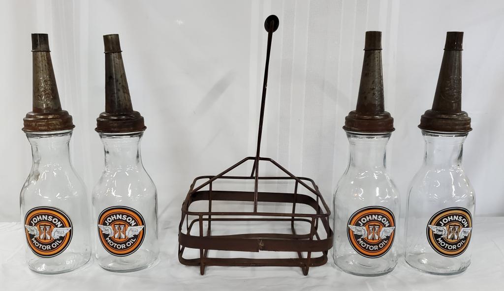 Set of 4 Johnson Motor Oil Bottles in Rack: Set of 4 Johnson Motor Oil Bottles in Rack. Includes Metal Top with Cap. Photo's are considered part of the description and condition. 801-38