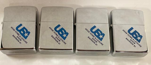4 Vintage Unused Zippo Lighters - Bahrain '81: 4 Unused vintage Zippo lighters. Front Lettering - USA Arab Home & Leisure Show Bahrain '81. Zippo, Bradford, PA. Photo's are considered part of the description and condition.