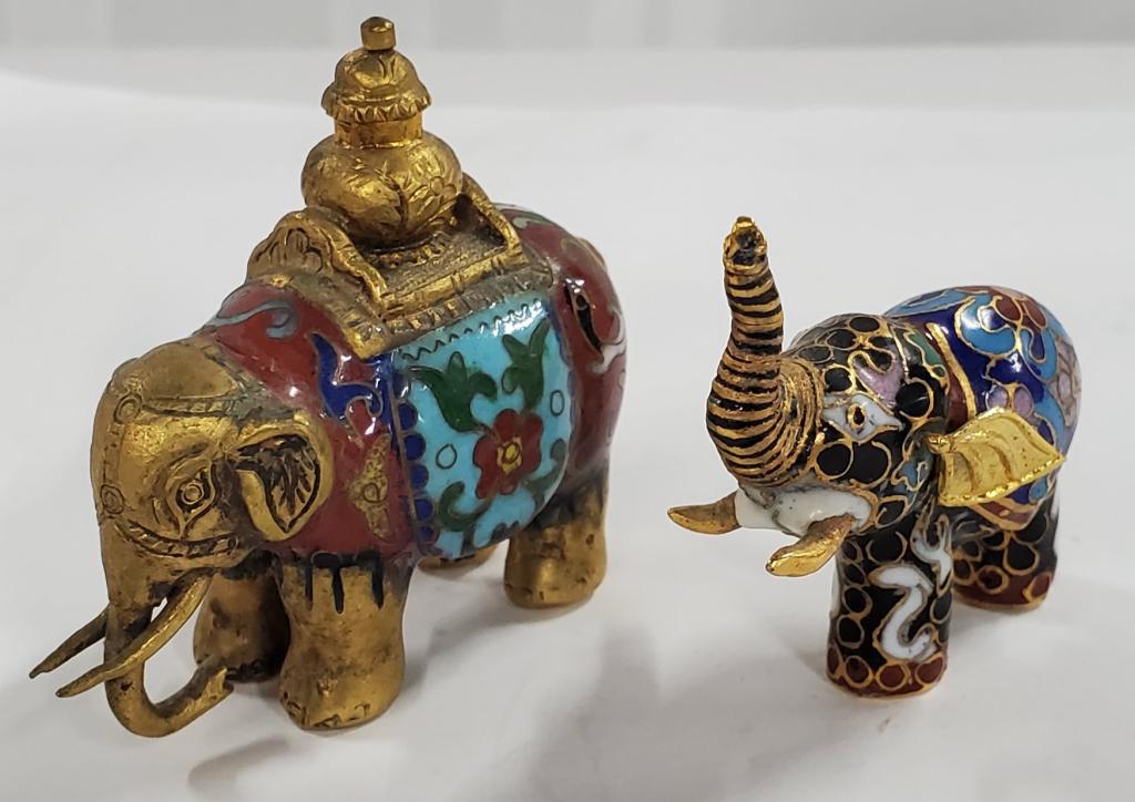 2 Small Cloisonne Elephants: 2 Small Cloisonne Elephants. *2 1/2" H x 2 1/2" W. *2" H x 2" W. Photo's are considered part of the description and condition.
