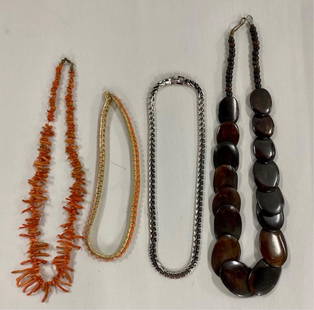 4 Costume Necklaces: 4 Costume Necklaces. Wood? Dyed Coral? Silver Tone etc. Photo's are considered part of the description and condition. 804