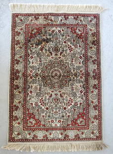 Small Silk Persian Style Throw Rug: Small Silk Persian Style Throw Rug. Fringe on both Ends. Burgundy, Cream, and Blue/Grey Colors. Nice Condition but has a stain - needs to be cleaned. Photos are considered part of the description