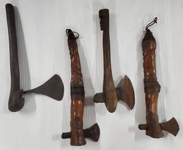 4 Ceremonial African Axes: 4 Ceremonial African Axes. *2 are Wood Carved with a Totem Pole Look. *2 are Wood Carved with a Figural Look. Apx. 12 1/2" - 13 3/4" High. Photos are considered part of the description and