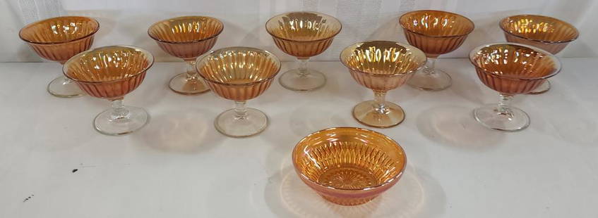 9 Marigold Sherbet Glasses and Small Bowl: 9 Marigold Sherbet Glasses and Small Bowl. *9 Marigold Sherbet Glasses - Apx. 3 1/2" H x 4" Diameter. *1 Marigold Bowl - Apx. 4 1/2" Diameter.Photos are considered part of the description and